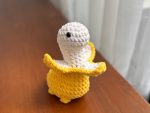 Rex bananasaurus crochet on the table